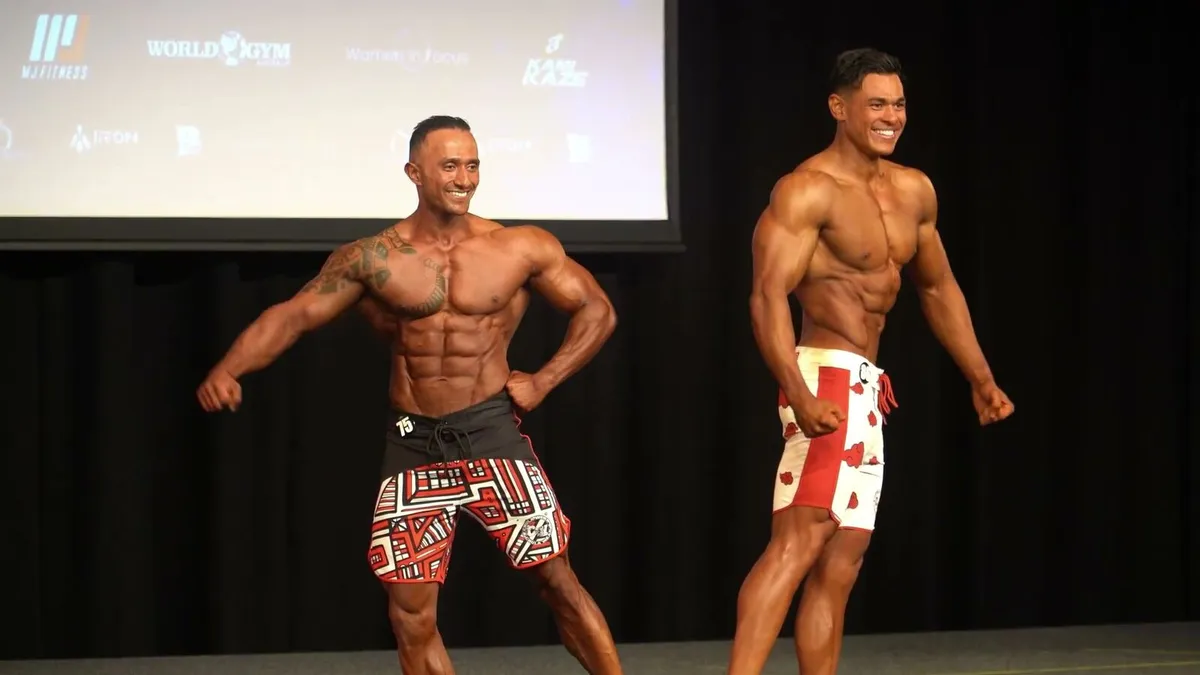 Sol and his rival posing side by side in the overall