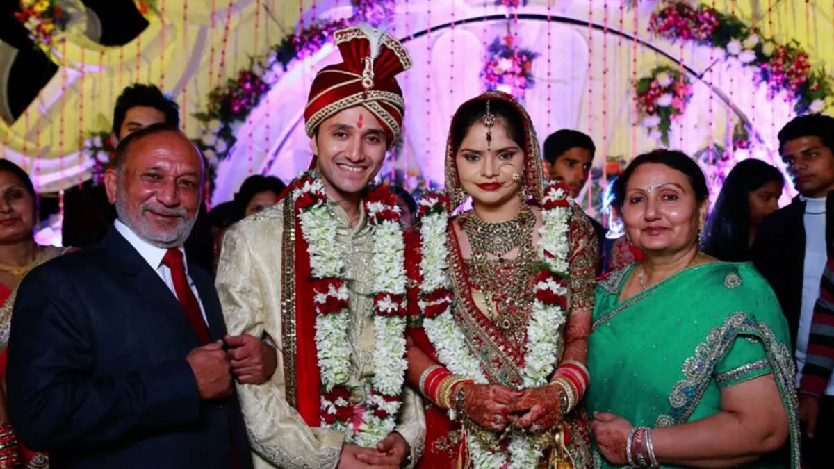 Sol and his wife on their wedding day with family